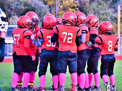 Holly Stampede Football Player Huddle